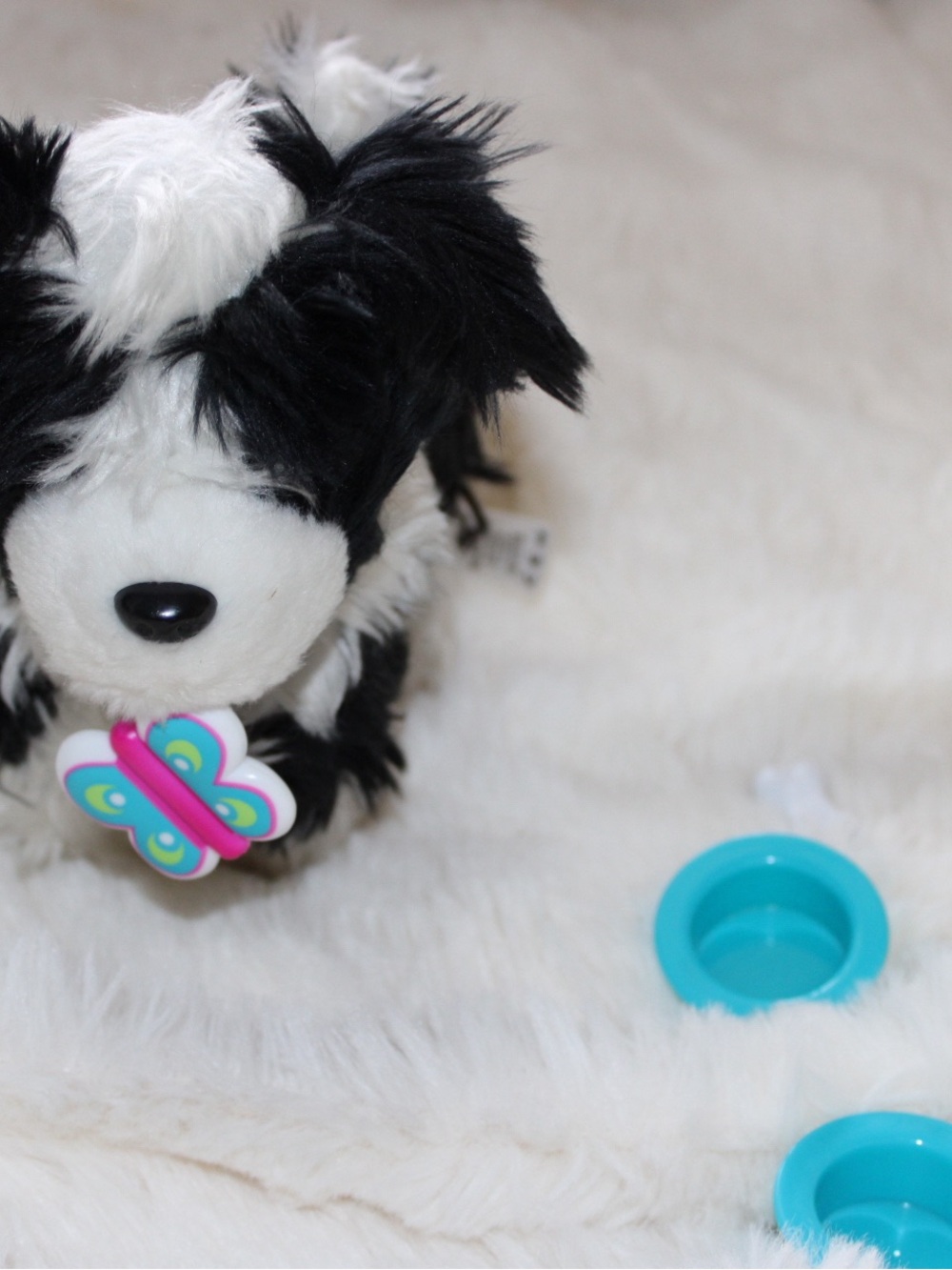 American girl doll Melody’s black and white dog